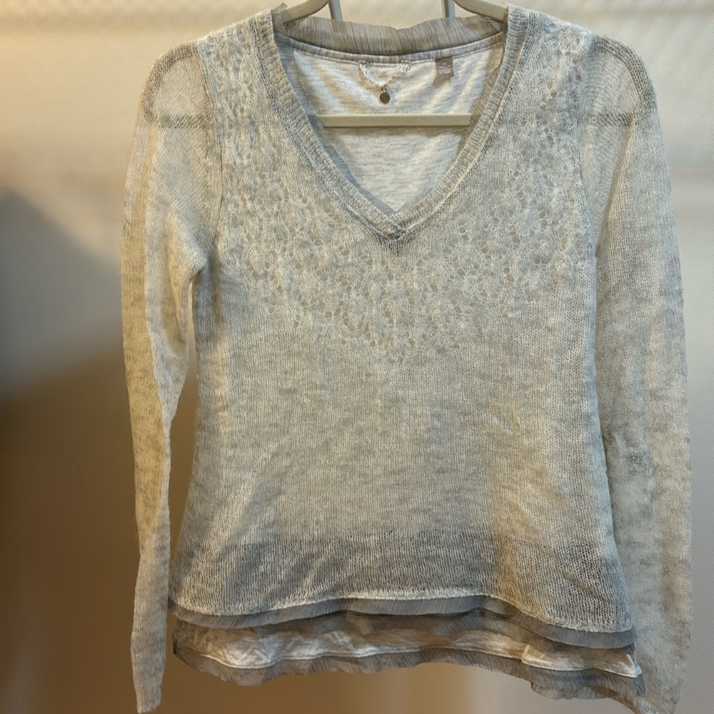 V neck with silk accents and cotton lining for comfort